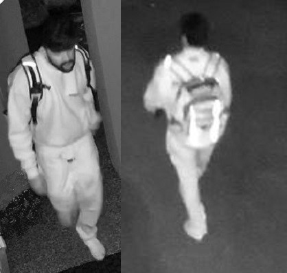 Two surveillance stills of suspect shown side by side -- one from the front, one from the back 