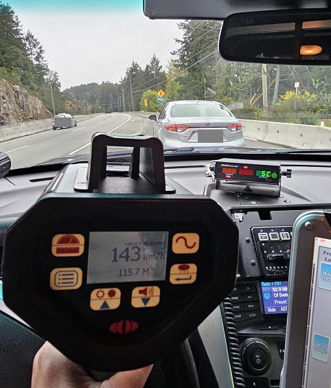 police radar displaying 143 km/hr