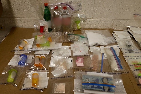  Photo 1 Drugs and Cash seized by police